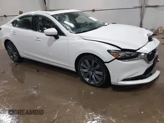2019 Mazda 6 Grand Touring with VIN JM1GL1TYXK1505439, listed as a IAAI auction lot 41672678 with 52,990 mi miles. Bid and sale history available at carsss.com. Image 1.