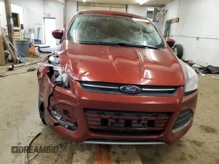 2016 Ford Escape SE z VIN 1FMCU0G9XGUB59807, wystawiony jako Copart lot #57920065 z przebiegiem 124 482 mil mil oraz Szkoda całkowita • Salvage title. Historia ofert i sprzedaży dostępna na DreamBid. Obrazek 5.