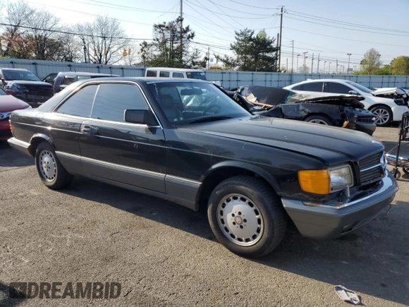 1989 Mercedes-Benz 560 with VIN WDBCA45E4KA498009, listed as a Copart auction lot 53897215 with 366,931 mi miles and Clean Title. Bid and sale history available at DreamBid. Image 4.