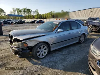 1999 BMW 5 Series 540i z VIN WBADN5339XGC91489, wystawiony jako Copart lot #52009545 z przebiegiem 229 003 mil mil oraz Szkoda całkowita • Salvage title. Historia ofert i sprzedaży dostępna na DreamBid. Obrazek 1.
