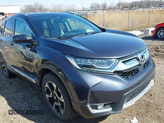 2018 Honda CR-V Touring with VIN 7FARW2H94JE044336, listed as a IAAI auction lot 41934128 with 70,861 mi miles. Bid and sale history available at carsss.com. Image 1.