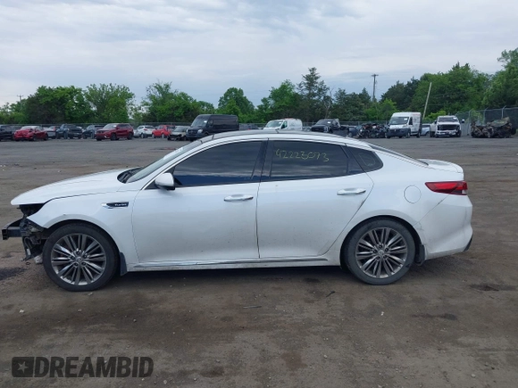 2016 Kia Optima SXL Turbo with VIN 5XXGV4L26GG067859, listed as a IAAI auction lot 42223073 with 133,511 mi miles and . Bid and sale history available at DreamBid. Image 14.