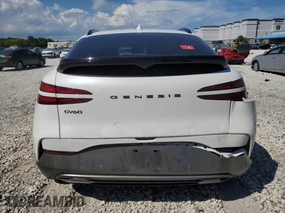 2023 Genesis GV60 Performance with VIN KMUKEDTB6PU017545, listed as a Copart auction lot 74197374 with 9,089 mi miles and Salvage Title. Bid and sale history available at carsss.com. Image 6.