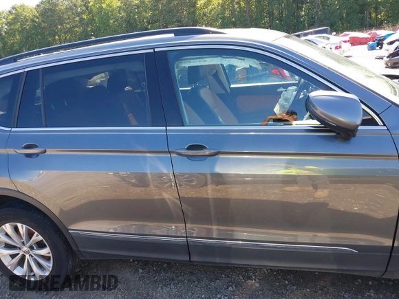 2018 Volkswagen Tiguan SEL with VIN 3VV2B7AX8JM088223, listed as a IAAI auction lot 42547747 with 105,423 mi miles and . Bid and sale history available at DreamBid. Image 14.