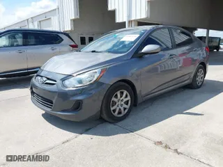 2014 Hyundai Accent GLS with VIN KMHCT4AE4EU661497, listed as a IAAI auction lot 41987134 with 129,508 mi miles. Bid and sale history available at carsss.com. Image 2.