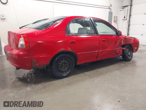 2003 Kia Spectra GS z VIN KNAFB161035115874, wystawiony jako IAAI lot #42179809 z przebiegiem 127 594 mil mil oraz . Historia ofert i sprzedaży dostępna na DreamBid. Obrazek 4.