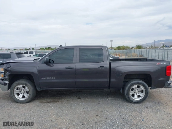 2014 Chevrolet Silverado 1500 LT with VIN 3GCUKREC7EG561639, listed as a IAAI auction lot 42020364 with 154,785 mi miles. Bid and sale history available at carsss.com. Image 14.