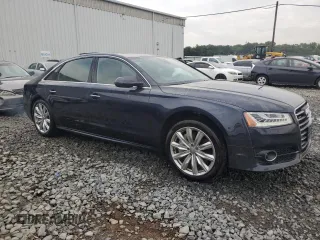 2018 Audi A8 with VIN WAU44AFD0JN000152, listed as a Copart auction lot 62844254 with 47,325 mi miles and Salvage title. Bid and sale history available at DreamBid. Image 4.