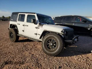 2021 Jeep Wrangler Unlimited Sport Altitude with VIN 1C4HJXDN1MW597113, listed as a Copart auction lot 80121424 with 50,409 mi miles and Salvage title. Bid and sale history available at DreamBid. Image 4.