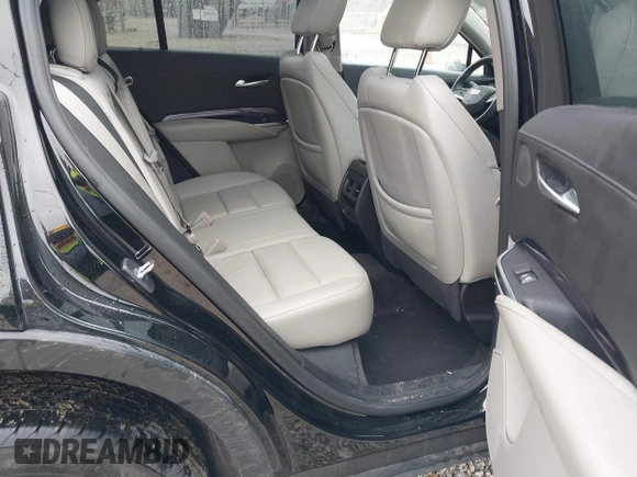 2023 Cadillac XT4 AWD Luxury with VIN 1GYFZBR42PF103973, listed as a IAAI auction lot 41902923 with 70,571 mi miles and . Bid and sale history available at DreamBid. Image 8.