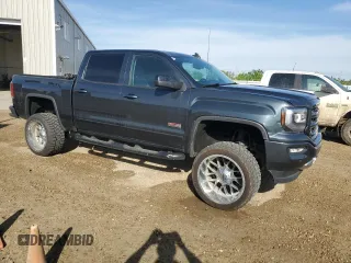2017 GMC Sierra 1500 SLT z VIN 3GTU2NEC4HG518549, wystawiony jako Copart lot #56894335 z przebiegiem 127 021 mil mil oraz Tytuł czysty. Historia ofert i sprzedaży dostępna na DreamBid. Obrazek 4.