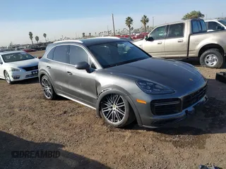 2023 Porsche Cayenne Turbo z VIN WP1AF2AY9PDA20588, wystawiony jako IAAI lot #41380763 z przebiegiem 10 787 mil mil oraz . Historia ofert i sprzedaży dostępna na DreamBid. Obrazek 1.