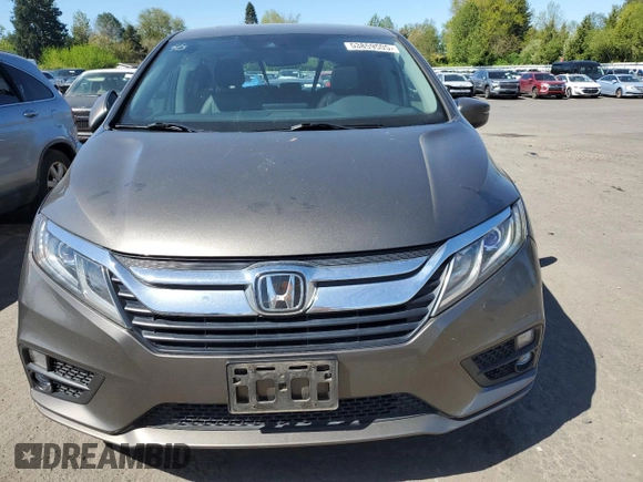2018 Honda Odyssey EX-L z VIN 5FNRL6H71JB016424, wystawiony jako Copart lot #53859505 z przebiegiem 91 669 mil mil oraz Szkoda całkowita • Salvage title. Historia ofert i sprzedaży dostępna na DreamBid. Obrazek 5.