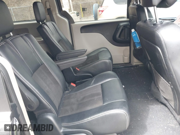 2019 Dodge Grand Caravan SXT with VIN 2C4RDGCG9KR804867, listed as a IAAI auction lot 42032311 with 157,351 mi miles and . Bid and sale history available at DreamBid. Image 8.