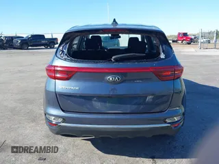 2020 Kia Sportage LX with VIN KNDPM3AC6L7720640, listed as a IAAI auction lot 41843861 with 114,977 mi miles. Bid and sale history available at carsss.com. Image 6.