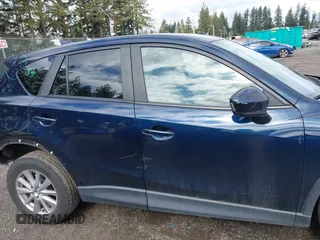 2015 Mazda CX-5 Touring with VIN JM3KE4CY5F0453646, listed as a IAAI auction lot 41740574 with 91,167 mi miles. Bid and sale history available at carsss.com. Image 14.