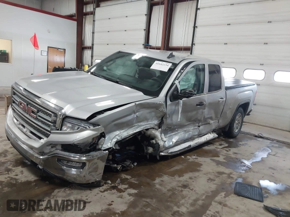 2018 GMC Sierra 1500 SLE z VIN 1GTV2MEH8JZ357073, wystawiony jako IAAI lot #41642234 z przebiegiem 105 007 mil mil oraz . Historia ofert i sprzedaży dostępna na DreamBid. Obrazek 2.