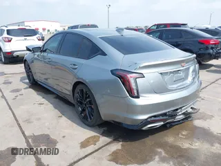 2023 Cadillac CT5 Sport z VIN 1G6DP5RK7P0113696, wystawiony jako IAAI lot #41904906 z przebiegiem 89 191 mil mil oraz . Historia ofert i sprzedaży dostępna na DreamBid. Obrazek 3.