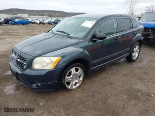 2007 Dodge Caliber SXT with VIN 1B3HB48B77D330653, listed as a IAAI auction lot 41527364 with 218,823 mi miles. Bid and sale history available at carsss.com. Image 17.