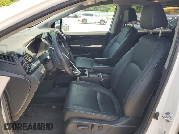 2023 Honda Odyssey Touring with VIN 5FNRL6H84PB016614, listed as a Copart auction lot 59336585 with 36,932 mi miles and Salvage title. Bid and sale history available at DreamBid. Image 7.
