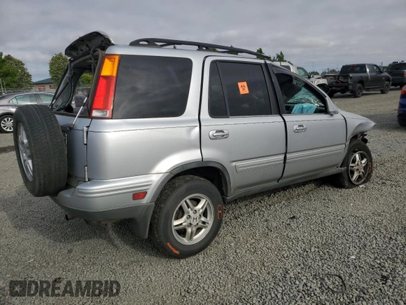 2001 Honda CR-V SE with VIN JHLRD18711C051299, listed as a Copart auction lot 64098224 with 231,433 mi miles and Clean Title. Bid and sale history available at carsss.com. Image 3.