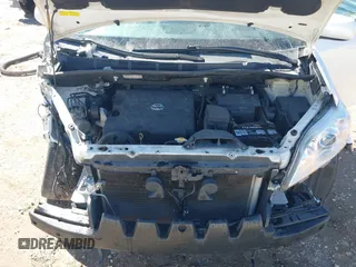 2015 Toyota Sienna XLE with VIN 5TDYK3DC7FS661582, listed as a IAAI auction lot 41688972 with 145,953 mi miles. Bid and sale history available at carsss.com. Image 10.