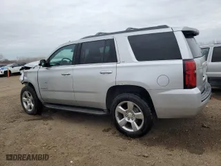 2015 Chevrolet Tahoe LS with VIN 1GNSKAKCXFR306859, listed as a Copart auction lot 83411724 with 154,517 mi miles and Salvage Title. Bid and sale history available at carsss.com. Image 2.