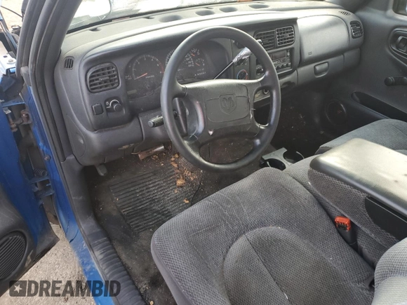 1998 Dodge Dakota SLT z VIN 1B7FL26X3WS633719, wystawiony jako Copart lot #82381914 z przebiegiem Nie podano mil oraz Szkoda całkowita • Salvage title. Historia ofert i sprzedaży dostępna na DreamBid. Obrazek 8.