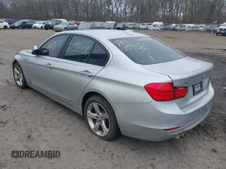 2015 BMW 3 Series 328i xDrive with VIN WBA3B5G57FNS12490, listed as a IAAI auction lot 41927689 with 999,999 mi miles. Bid and sale history available at carsss.com. Image 3.