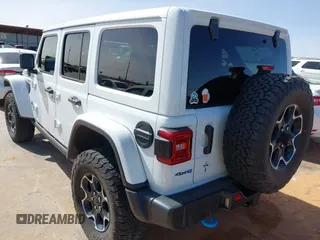 2023 Jeep Wrangler Rubicon with VIN 1C4JJXR63PW580370, listed as a IAAI auction lot 42017282 with 31,823 mi miles and . Bid and sale history available at DreamBid. Image 3.
