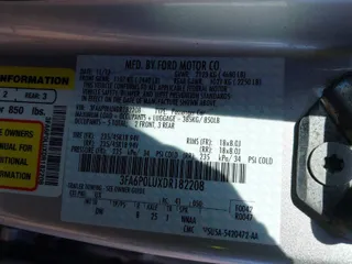 2013 Ford Fusion SE Hybrid with VIN 3FA6P0LUXDR182208, listed as a IAAI auction lot 41885221 with 111,242 mi miles. Bid and sale history available at carsss.com. Image 9.