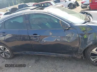 2016 Honda Civic EX-L with VIN 19XFC1F79GE003492, listed as a IAAI auction lot 42563306 with 166,420 mi miles and . Bid and sale history available at DreamBid. Image 13.