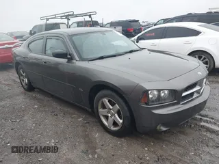 2009 Dodge Charger SXT with VIN 2B3KA33V59H573761, listed as a IAAI auction lot 41545196 with 172,065 mi miles and . Bid and sale history available at carsss.com. Image 1.