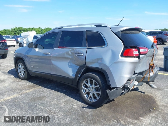 2014 Jeep Cherokee Latitude with VIN 1C4PJLCS6EW103423, listed as a IAAI auction lot 40118289 with 112,120 mi miles and . Bid and sale history available at DreamBid. Image 3.