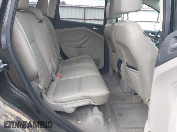 2013 Ford Escape SEL with VIN 1FMCU9H99DUA94169, listed as a IAAI auction lot 41937675 with 106,405 mi miles. Bid and sale history available at carsss.com. Image 8.