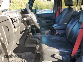 2018 Jeep Wrangler JK Unlimited Rubicon Recon with VIN 1C4HJWFG5JL803636, listed as a Copart auction lot 76370924 with 77,943 mi miles and Salvage Title. Bid and sale history available at carsss.com. Image 7.