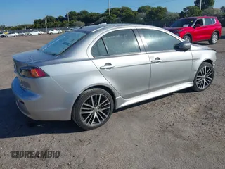 2017 Mitsubishi Lancer ES with VIN JA32V2FW1HU000481, listed as a IAAI auction lot 41316272 with 107,115 mi miles. Bid and sale history available at carsss.com. Image 4.