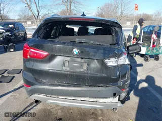 2017 BMW X1 xDrive28i with VIN WBXHT3C37H5F82992, listed as a IAAI auction lot 41293740 with 161,418 mi miles. Bid and sale history available at carsss.com. Image 16.