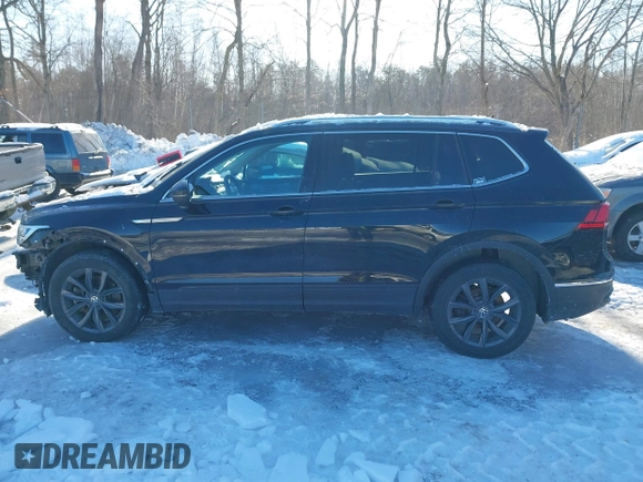 2022 Volkswagen Tiguan SE z VIN 3VV2B7AX4NM036657, wystawiony jako IAAI lot #41591503 z przebiegiem 45 416 mil mil oraz . Historia ofert i sprzedaży dostępna na DreamBid. Obrazek 14.