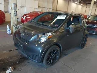 2012 Scion iQ with VIN JTNJJXB02CJ009171, listed as a IAAI auction lot 41425041 with 117,714 mi miles. Bid and sale history available at carsss.com. Image 2.