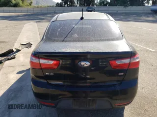 2014 Kia Rio LX with VIN KNADM4A35E6407058, listed as a Copart auction lot 72997044 with 76,215 mi miles and Salvage Title. Bid and sale history available at DreamBid. Image 6.