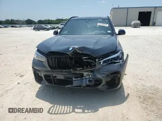 2021 BMW X5 xDrive40i z VIN 5UXCR6C01M9E82286, wystawiony jako Copart lot #60260035 z przebiegiem Nie podano mil oraz Szkoda całkowita • Salvage title. Historia ofert i sprzedaży dostępna na DreamBid. Obrazek 14.