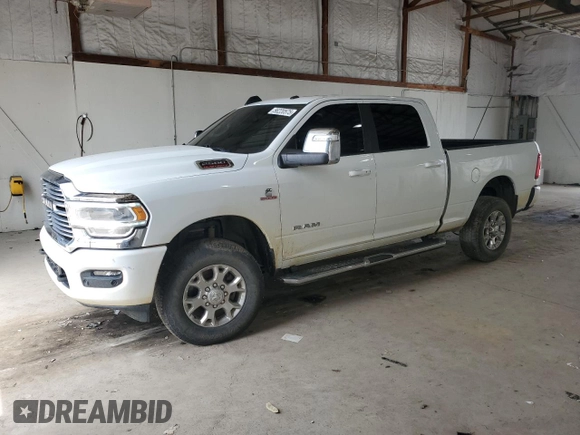 2023 Ram 2500 Laramie with VIN 3C6UR5FL2PG632162, listed as a Copart auction lot 56220575 with 59,902 mi miles and Salvage title. Bid and sale history available at DreamBid. Image 1.