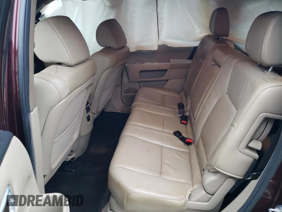 2012 Honda Pilot EX-L z VIN 5FNYF4H51CB070976, wystawiony jako Copart lot #73470204 z przebiegiem 223 572 mil mil oraz Szkoda całkowita • Salvage title. Historia ofert i sprzedaży dostępna na DreamBid. Obrazek 12.