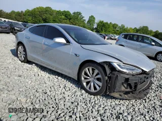 2017 Tesla Model S 60 with VIN 5YJSA1E15HF203248, listed as a Copart auction lot 54923855 with 84,214 mi miles and Salvage title. Bid and sale history available at DreamBid. Image 4.