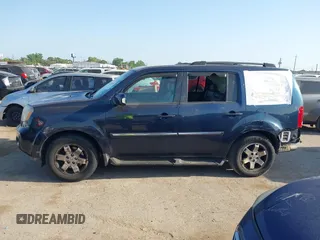 2011 Honda Pilot Touring with VIN 5FNYF4H92BB090056, listed as a IAAI auction lot 42010682 with 201,640 mi miles. Bid and sale history available at carsss.com. Image 14.
