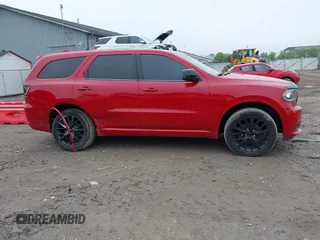 2015 Dodge Durango SXT with VIN 1C4RDJAG2FC128082, listed as a IAAI auction lot 42447872 with 141,655 mi miles and . Bid and sale history available at DreamBid. Image 12.