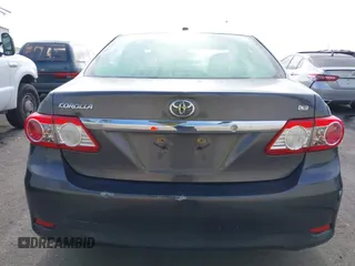 2011 Toyota Corolla L with VIN JTDBU4EE7B9162022, listed as a IAAI auction lot 42066643 with 124,384 mi miles. Bid and sale history available at carsss.com. Image 17.
