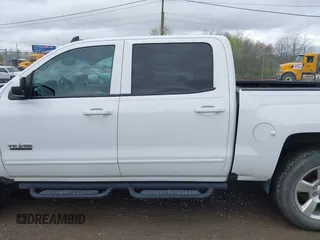 2016 Chevrolet Silverado 1500 LT with VIN 3GCUKREC0GG136136, listed as a IAAI auction lot 41971199 with 179,045 mi miles and . Bid and sale history available at DreamBid. Image 14.