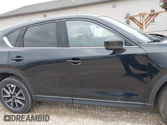 2018 Mazda CX-5 Grand Touring with VIN JM3KFBDM3J0384431, listed as a IAAI auction lot 42013474 with 65,018 mi miles. Bid and sale history available at carsss.com. Image 13.